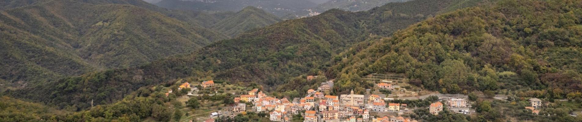 A breathtaking aerial view of the picturesque village of Gameragna nestled in the Ligurian hills.