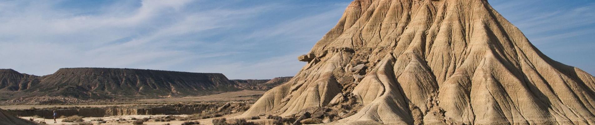 Explore the striking rock formations of Bardenas Reales, a semi-desert region in Spain.
